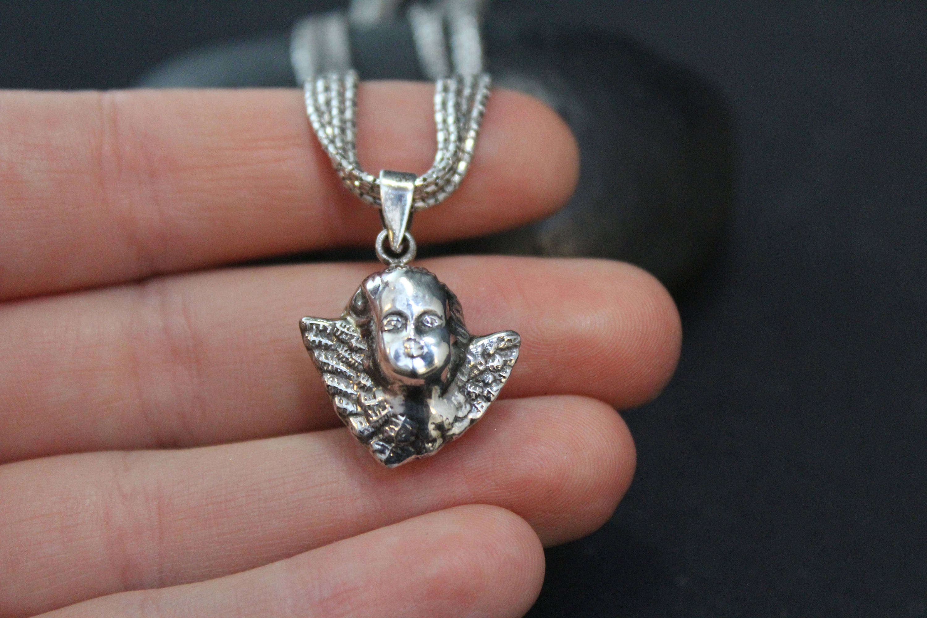 Sterling silver on sale cherub necklace