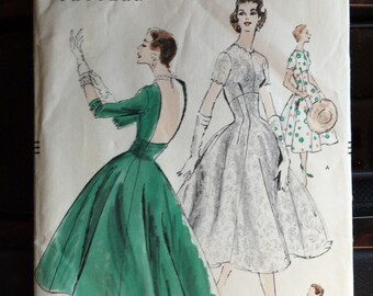 Vogue 8822; ©1956; One Piece Dress Flared From Waistline with More Fullness Toward Back, Bust 30, Uncut