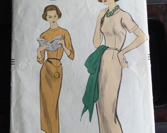 Vogue 9240; ©1957; One Piece Dress. Slim skirt joins the bodice at waistline. Collarless round neckline. Bust 31