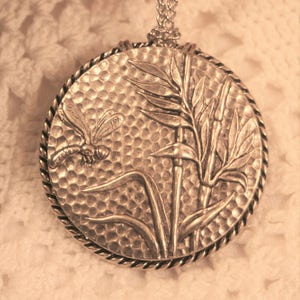 Handsome Roped Round Pebble-Textured Dragonfly in the Marshes Silvertone Pendant Necklace