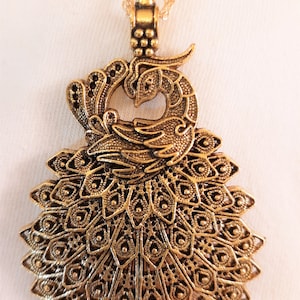 Gorgeous Large Sculpted Filigree Cascading Tail Peacock Figural Goldtone Pendant Necklace