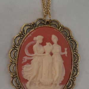 Dainty Openwork Lacy Scallop Rim Peach & Cream Two Greek Goddesses With Urn Statue Pedestal Goldtone Cameo Pendant Necklace