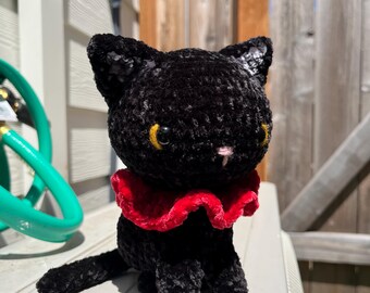 Black velvet ruffle cat