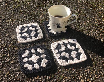 Black and white crochet granny square coasters