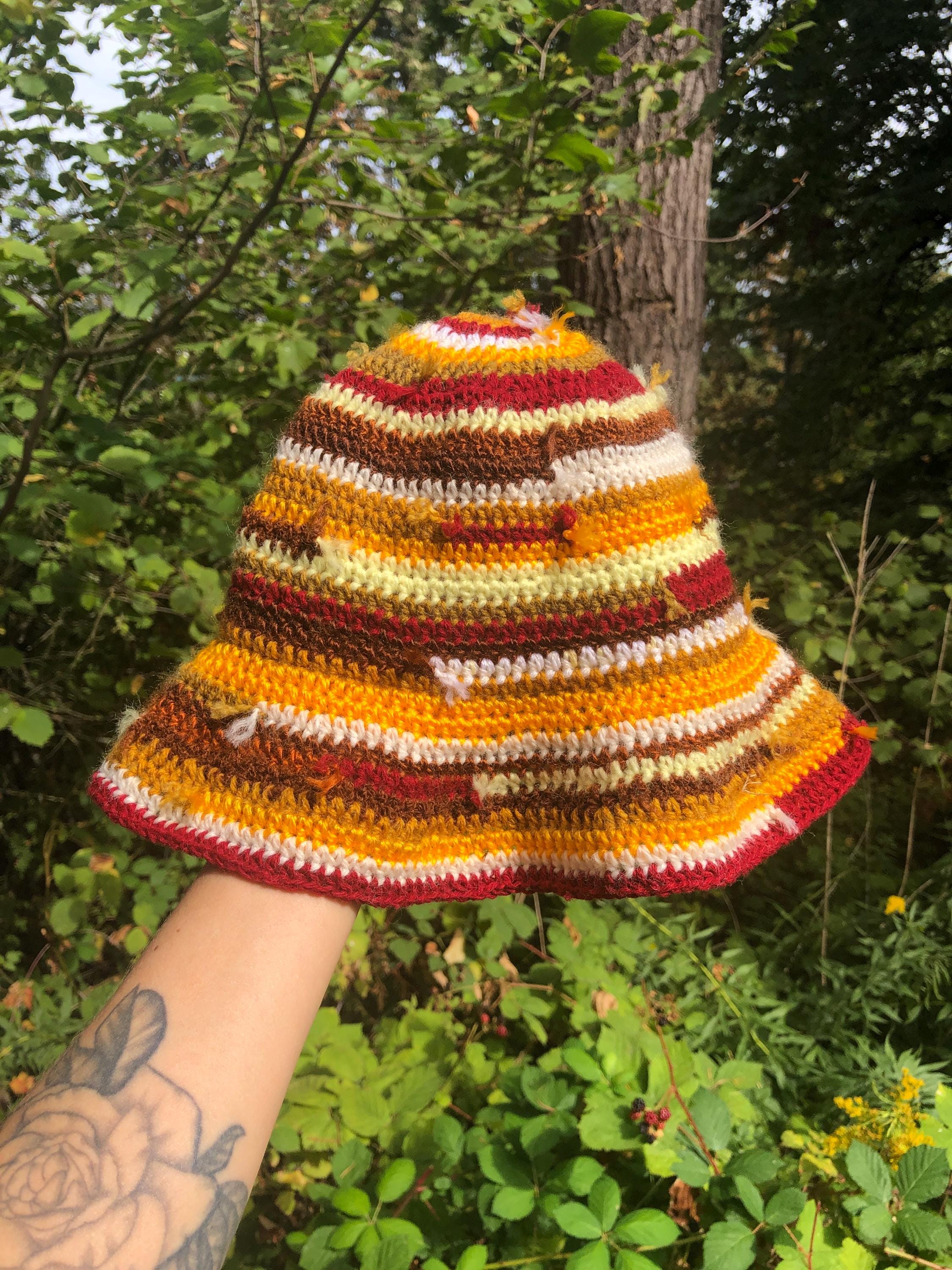 Distressed bucket hat, sun, floppy, visor, brim, yarn ends, patchwork, red, yellow, brown, lightweight, handmade, crochet, acrylic, summer