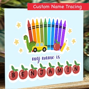 May include: A light blue card with the text "Custom Name Tracing" and "my name is". The card features colourful crayon illustrations, a yellow car, a green dinosaur, a red apple, and the name "BENJAMIN" in apple shapes.