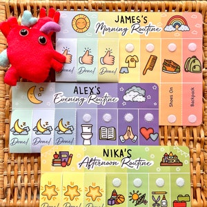 May include: Three colourful charts with illustrations and text for children's daily routines. The charts are labelled "James's Morning Routine", "Alex's Evening Routine", and "Nika's Afternoon Routine". Each chart has a series of images and text that represent different activities, such as getting dressed, brushing teeth, and going to bed.