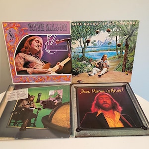 May include: Four vintage vinyl records by Dave Mason. The covers feature a psychedelic design with the artist's name and album titles. The albums are "Dave Mason", "Dave Mason Split Coconut", "Dave Mason is Alive!" and "Dave Mason - Anthology".