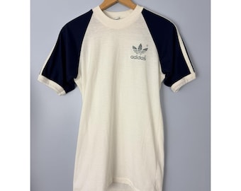 Camiseta Adidas Trefoil vintage de los años 80, fabricada en EE. UU., talla mediana, manga corta.
