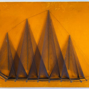 May include: A wall hanging made of string art depicting a series of triangles on a yellow background.