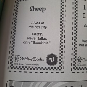 May include: A page from a Golden Books book featuring a card about a sheep. The card has a black and white checkered border and includes the text "Sheep", "Lives in the big city", and "FACT: Never talks, only 'Baaahh's.'". The Golden Books logo is also visible.