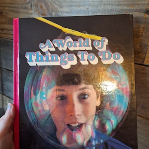 National geographic a world of things to do book.
