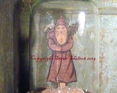 Belsnickel in a Glass Cloche by Steve Shelton.