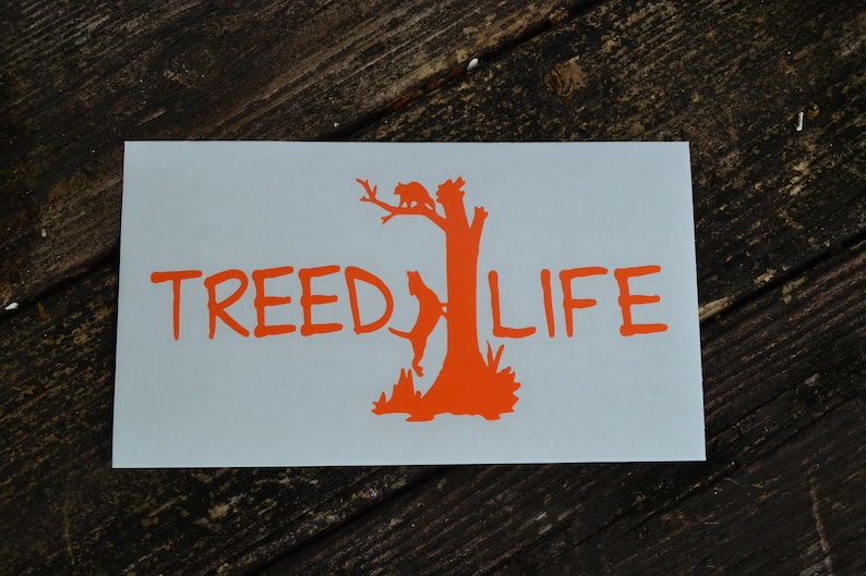 May include: Orange vinyl sticker with a tree silhouette and the text "TREEDLIFE".