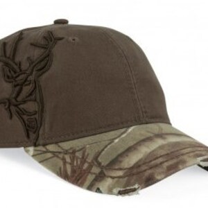 May include: A brown baseball cap with a camouflage brim and a deer head embroidered on the front.