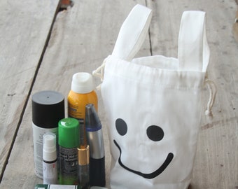 Small bag handmade from cotton with a smiley