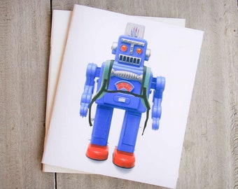 Blank notebook with vintage robot on the cover