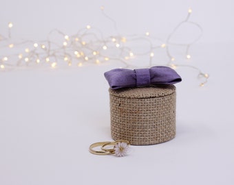 Small round wedding ring box, purple knot, white linen interior with wedding rings