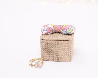 small square jute wedding ring box, pink liberty knot, white linen interior