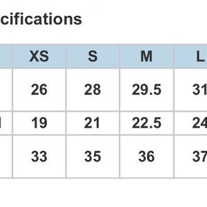 May include: Product specifications chart with measurements for clothing. Includes body length, body width, and sleeve length in inches for sizes XS to XL. The chart is on a white background with a light blue header.