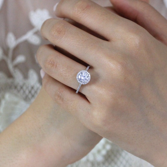 Round Halo Solitaire Ring | Fancy & Delicate Rings For Her | CaratLane