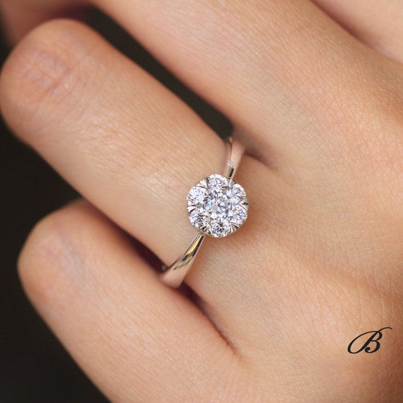 cluster solitaire ring