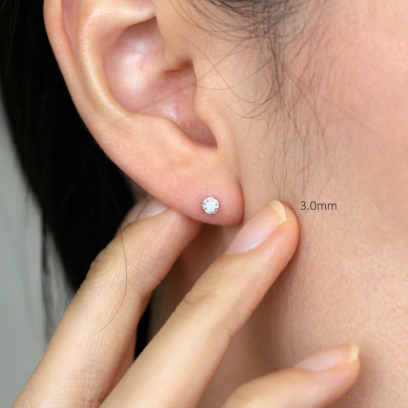 solitaire ear studs