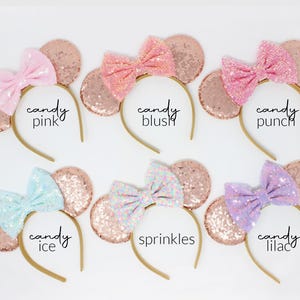 May include: Six headbands with rose gold sequin ears and fabric bows in various colors. Text labels include candy pink, candy blush, candy punch, candy ice, sprinkles, and candy lilac. Each headband features a thin, flexible band structure.