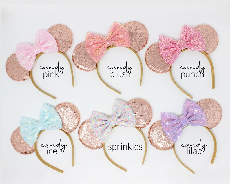 May include: Six headbands with rose gold sequin ears and fabric bows in various colors. Text labels include candy pink, candy blush, candy punch, candy ice, sprinkles, and candy lilac. Each headband features a thin, flexible band structure.