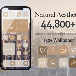 May include: A smartphone mockup with a brown and beige color scheme. The phone screen displays a calendar app with the month of December. The phone is surrounded by icons for social media apps, including Twitter, Facebook, Instagram, Pinterest, Messenger, WhatsApp, LinkedIn, and TikTok. The text "Natural Aesthetic 44,800+ app icons pack in 8 different colors ios 14 150+ Wallpaper" is displayed above the phone.