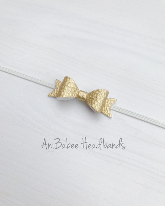 gold baby bow