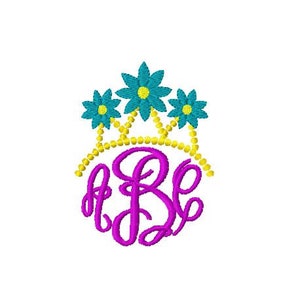 May include: A pink monogram with the letters "B" and "E" surrounded by a yellow crown with three blue flowers.
