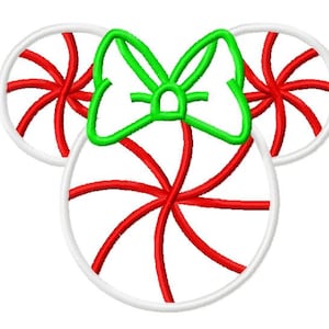 May include: A red and white peppermint candy cane design in the shape of Mickey Mouse ears with a green bow in the center.