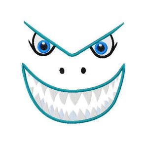 May include: Embroidered shark face design with blue eyes, eyebrows, and a teal outline. The shark's mouth is open, revealing sharp white teeth. The design is on a white background.