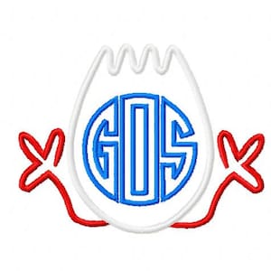 May include: White egg with red and blue accents, featuring a blue monogram "GIS" in the center. The egg has a jagged top and two red arms.