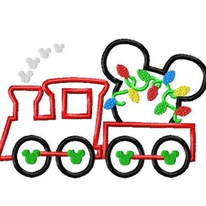 May include: A red toy train with a Mickey Mouse head on the back. The train has green wheels with Mickey Mouse ears on them. The Mickey Mouse head is decorated with green and red Christmas lights.