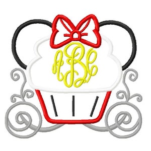 May include: A white cupcake with red and black frosting and a yellow monogram "B" on top. The cupcake has black mouse ears with a red bow on top.