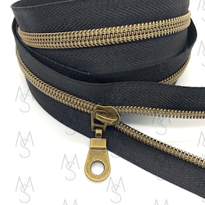 Antique Brass Nylon Coil Zipper with BlackTape & Antique Brass Pulls - Zipper by the Yard - Nylon Coil Zipper - Metallic Zipper