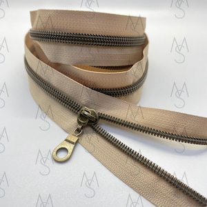 Antique Brass Nylon Coil Zipper with Beige Tape & Antique Brass Pulls - Zipper by the Yard - Nylon Coil Zipper - Metallic Zipper