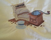 Embroidered art work, coffee scene
