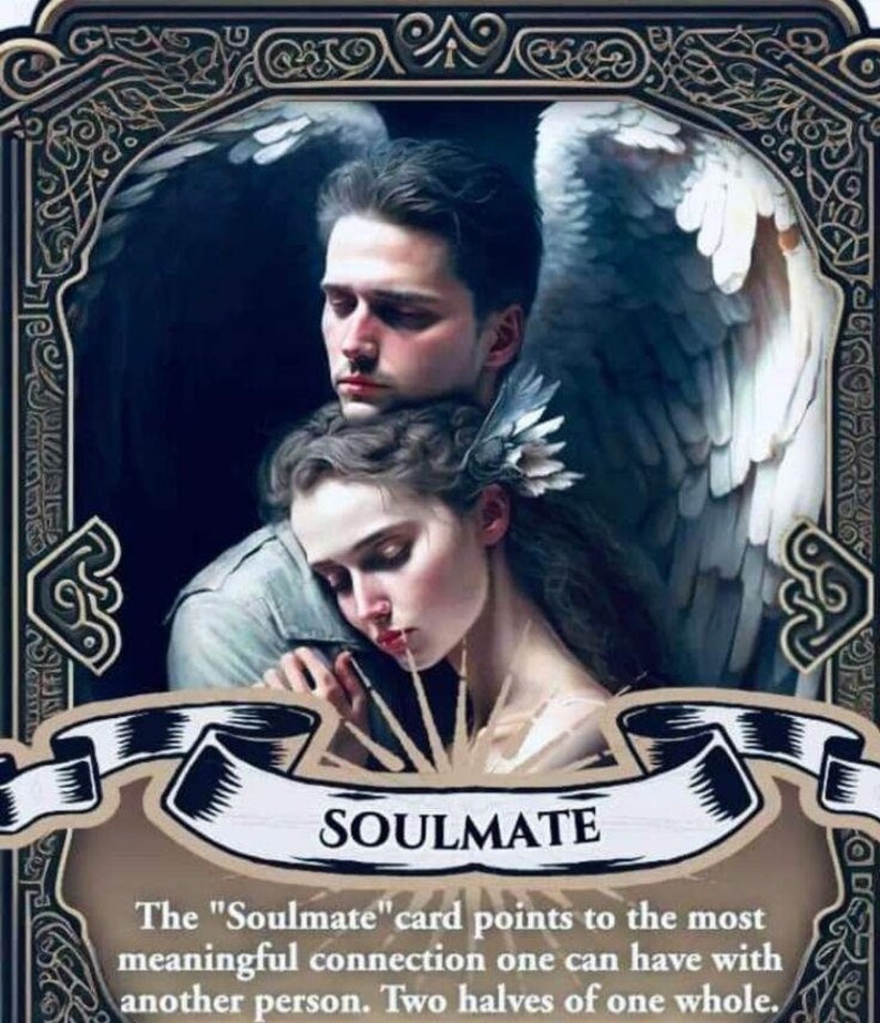 May include: An illustrated card featuring a man and woman embracing, with angel wings in the background. The card is framed with ornate borders and the word "SOULMATE" is displayed on a banner. Text below describes the card's meaning.
