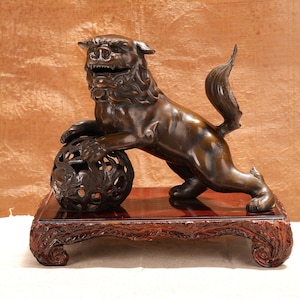 Antique Iron Japanese Shishi Leaning on Globe (24A-86)