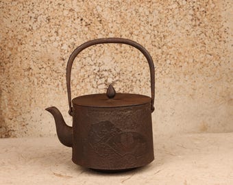 Antique Japanese Cast Iron Tetsubin (Water Kettle) with Fan, Pine, and Plum Relief Decoration, Taisho Era 1912-1926 | SKU: 26M-742-2