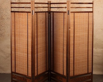 May include: A four-panel folding room divider constructed from dark brown wood frames and light tan woven bamboo inserts. The structure features horizontal bamboo pole accents at the top and decorative carved wood panels at the base.