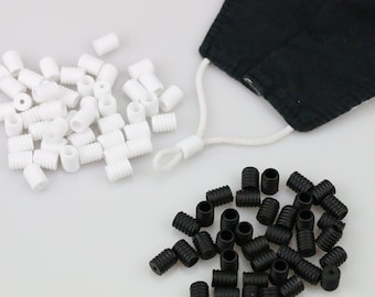 Ear loop cord locks for face mask Barrel silicone stopper Ear loop adjusters Elastic tightener Black and white elastic stoppers From Canada