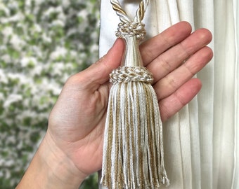Classy tie back with tassel. Golden and ivory colored elegant decor for window curtain. Handmade italian tuscany drapery decor