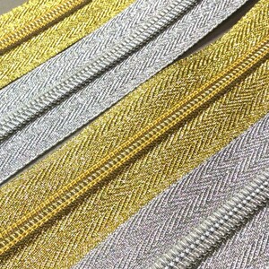 Cerniera lampo chiusura zip zipper lurex oro argento plastica 5mm divisibile singolo cursore lunghezza 80 centimetri immagine 2