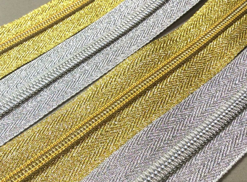 Cerniera lampo chiusura zip zipper lurex oro argento plastica 5mm divisibile singolo cursore lunghezza 80 centimetri immagine 2