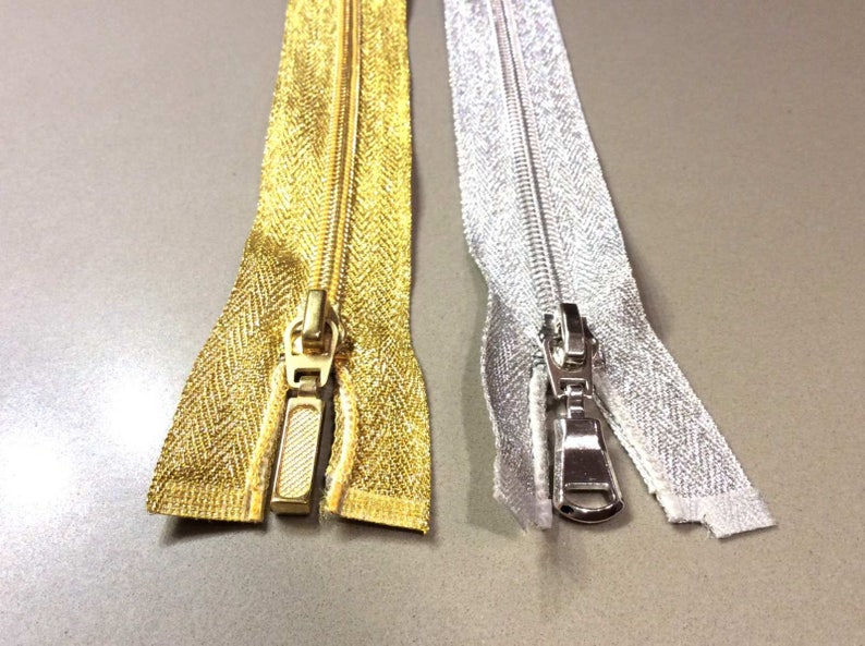 Cerniera lampo chiusura zip zipper lurex oro argento plastica 5mm divisibile singolo cursore lunghezza 80 centimetri immagine 1