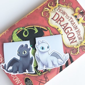 Weißes und schwarzes magnetisches Drachen Lesezeichen